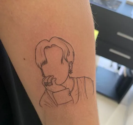 Minimalist BTS Tattoos for a Subtle Tribute