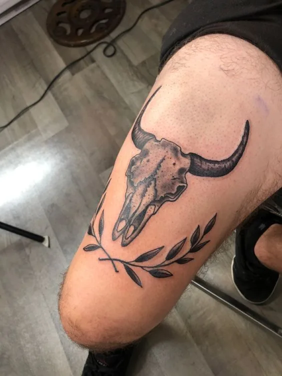 Explore different interpretations and variations of longhorn skull tattoos inspired by Zach Bryan.